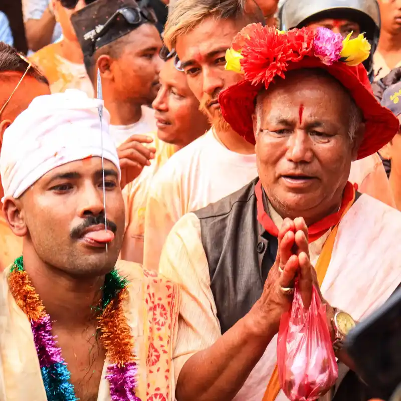 Participants in the Biska Jatra festival in Nepal, celebrating vibrant culture and tradition.