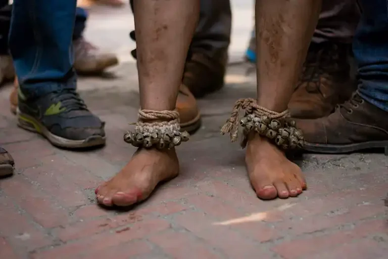 Participants in the Biska Jatra festival in Nepal with decorated ankles.
