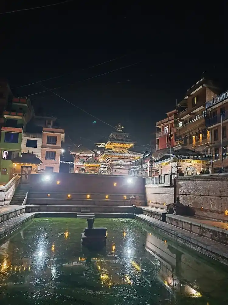 Biska Jatra festival night view in Nepal, showing illuminated temples and vibrant cultural celebration.