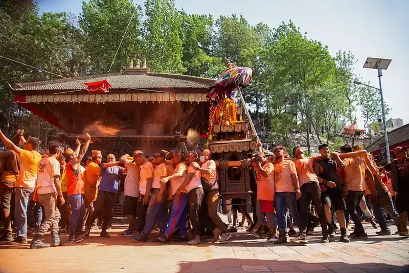 Biska Jatra festival procession in Tigani, Nepal, celebrating vibrant Nepali culture and tradition.
