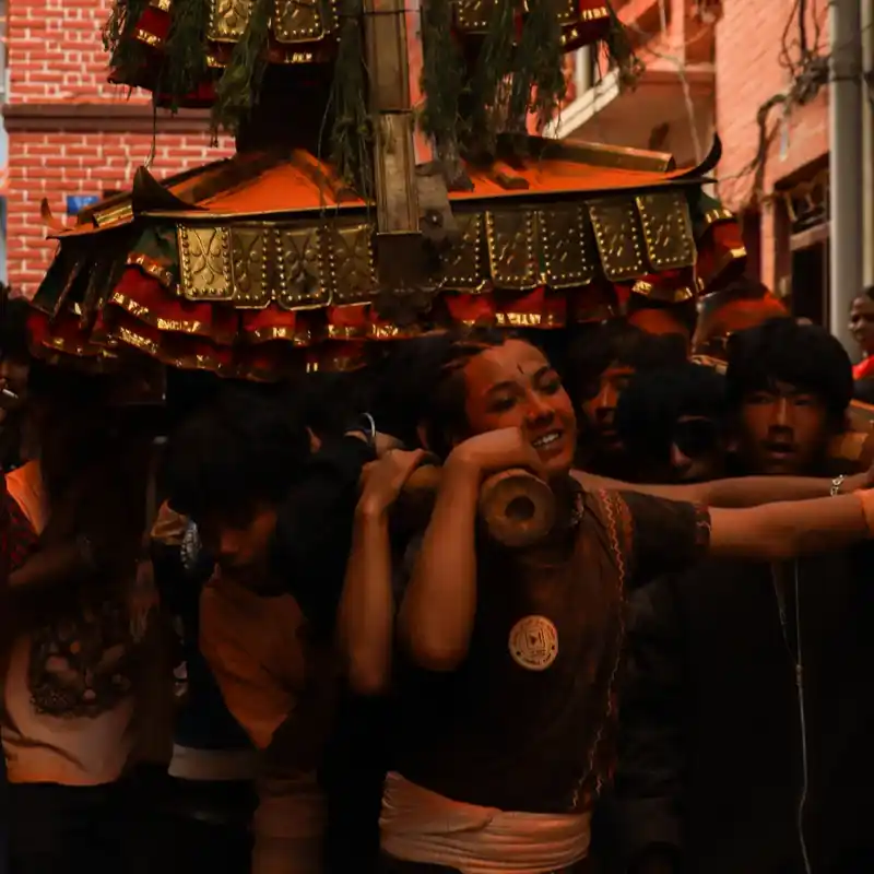 Biska Jatra festival celebration in Tigani, Nepal, featuring cultural procession and devotees.