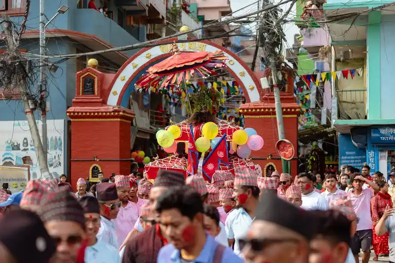 Festive atmosphere during the Biska Jatra festival in Nepal, celebrating rich culture and tradition.