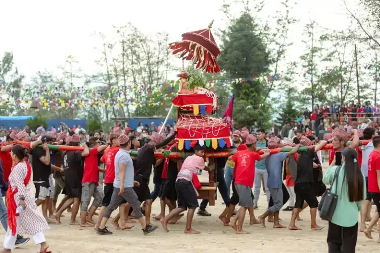 Devotees participate in the vibrant Biska Jatra festival procession in Nepal.