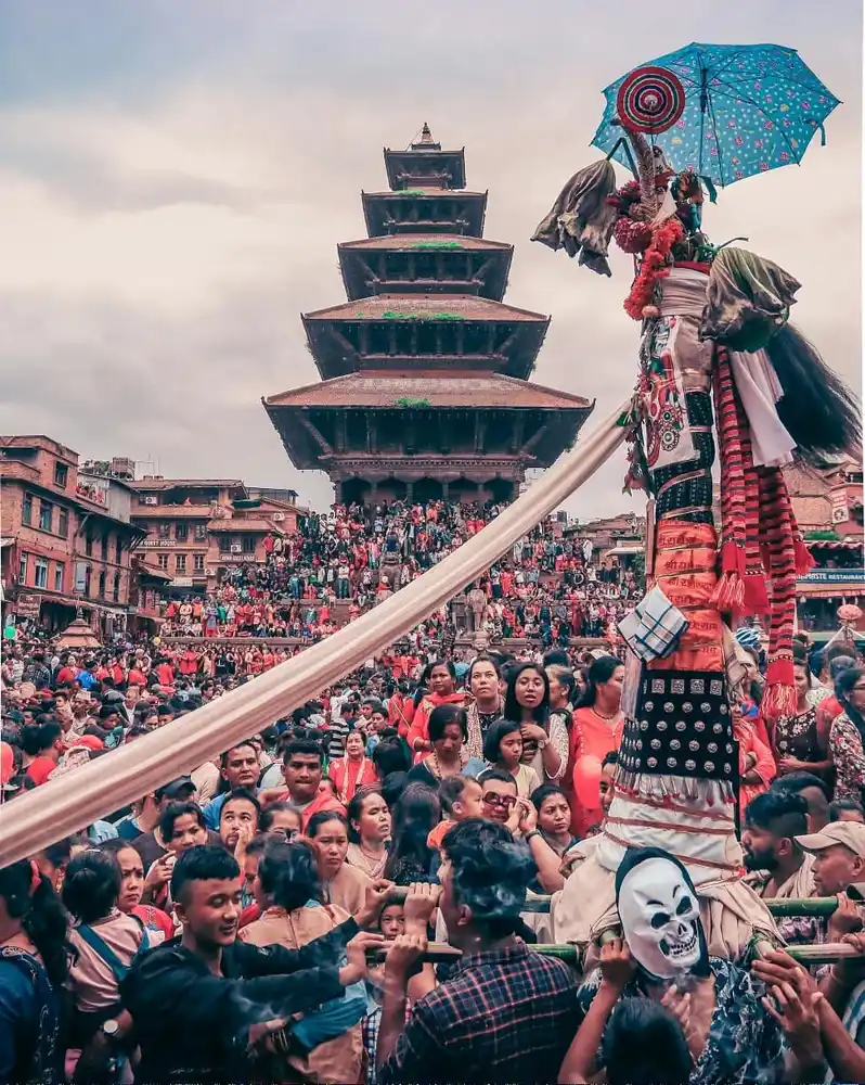 Vibrant Gai Jatra festival celebration in Bhaktapur, Nepal, showing cultural traditions and crowds.