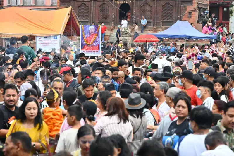 Crowd at a Nepal cultural or religious event, possibly Gai Jatra in Kathmandu.