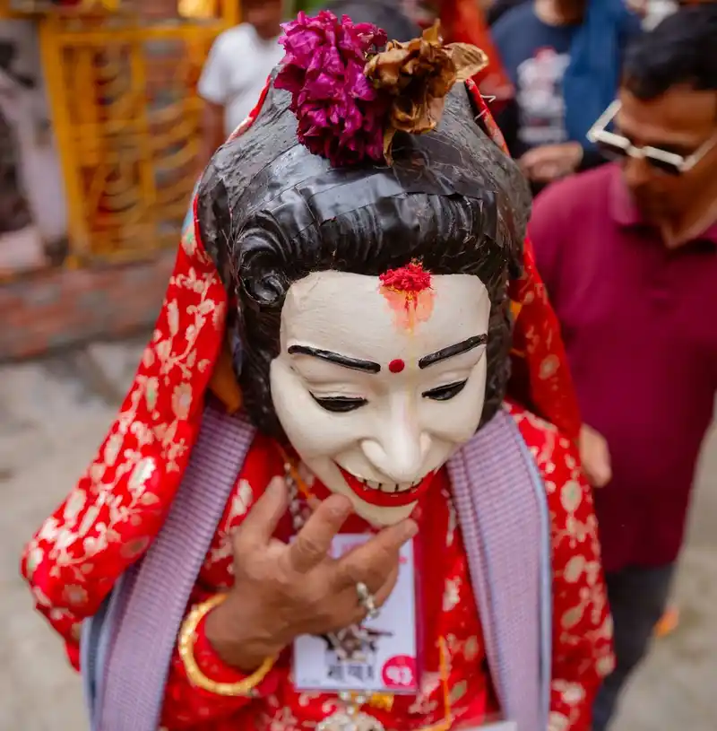 Traditional mask from the Gai Jatra festival in Kirtipur, Nepal, celebrating Nepali culture.