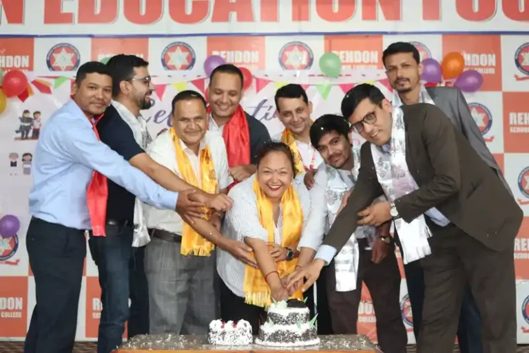 Honoring teachers during Guru Purnima in Nepal with a celebratory gathering.