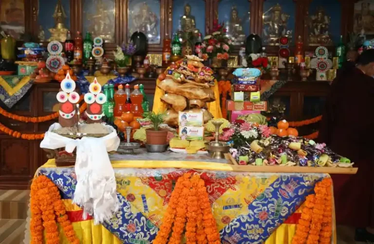 Festival display of offerings and deities during a Nepal Losar celebration.