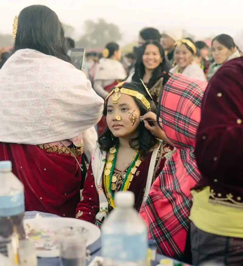 Nepali culture at Maghe Sankranti: A young girl in traditional Magar festival attire.