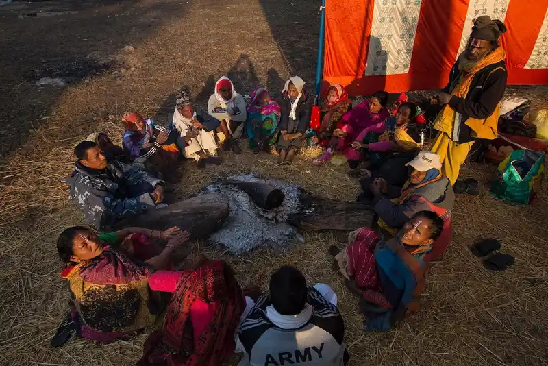 Nepalese community celebrating Maghe Sankranti Maghi Tharu festival rituals.
