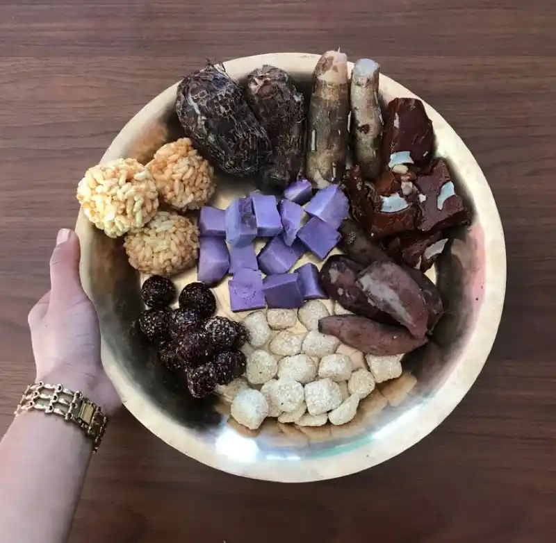 Assortment of traditional Nepali sweets and snacks for Maghe Sankranti celebration.