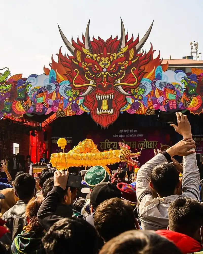 Crowd viewing the vibrant Sonam Loshar festival decorations in Nepal.