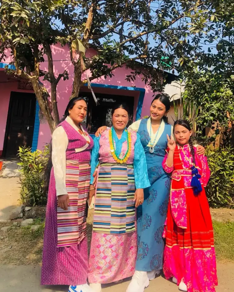 Nepali women celebrating Losar festival in traditional attire.