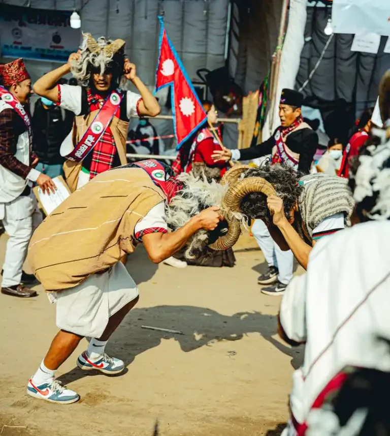 Loshar festival celebration in Nepal with traditional dancers and ceremonial bull heads.