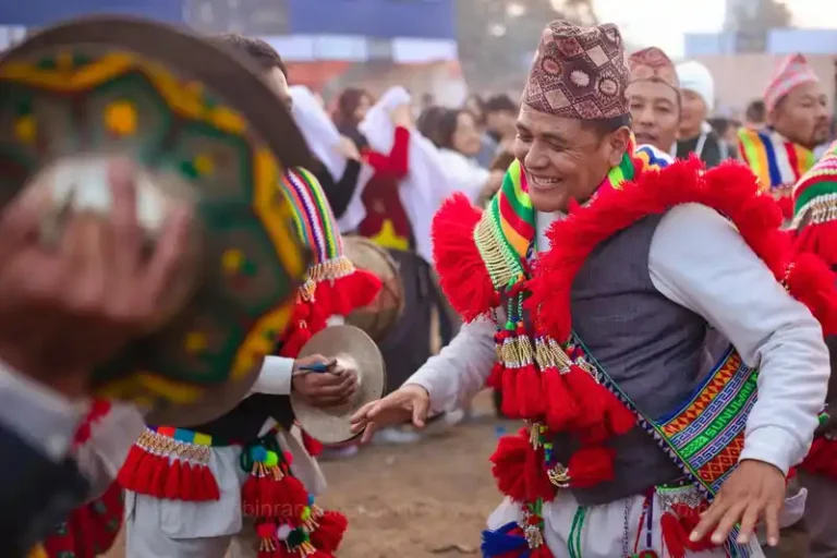 Festive scene of Kirat men celebrating Udhauli Parva in Nepal with traditional attire.